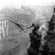 In this May 2, 1945 file photo, Soviet soldiers hoist the red flag over the Reichstag in Berlin. It's one of the iconic images of World War II: Soviet soldiers hoisting a red flag on top of the Reichstag after the fall of Berlin. What most people don't realize, however, is that the photograph isn't capturing the historical moment. Yevgeni Khaldei staged the scene on May 2, 1945 _ three days after the Soviets had captured the key seat of Nazi power.